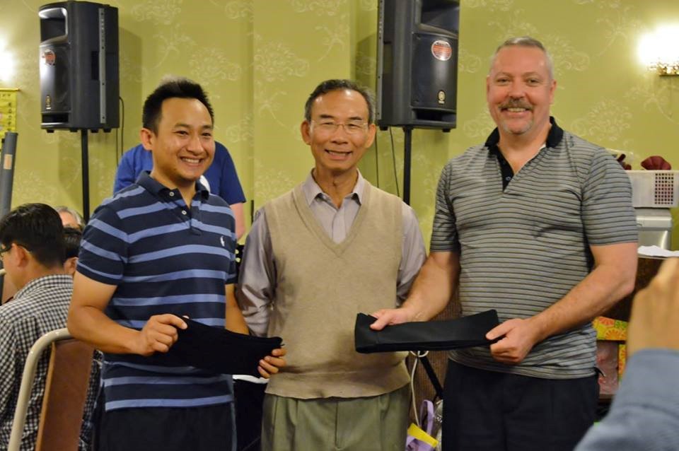  Trung, Sifu, and Ian after receiving their black sashes.